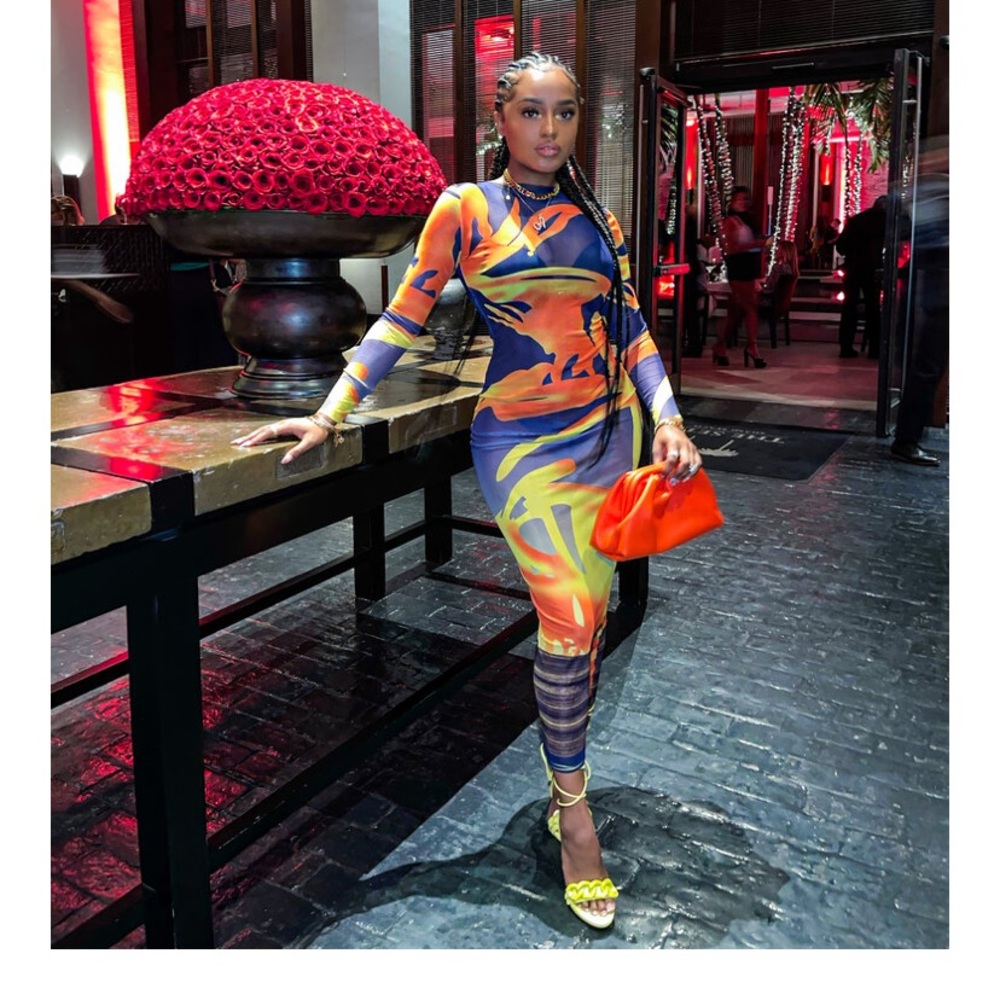 Beautiful multi colored midi dress.